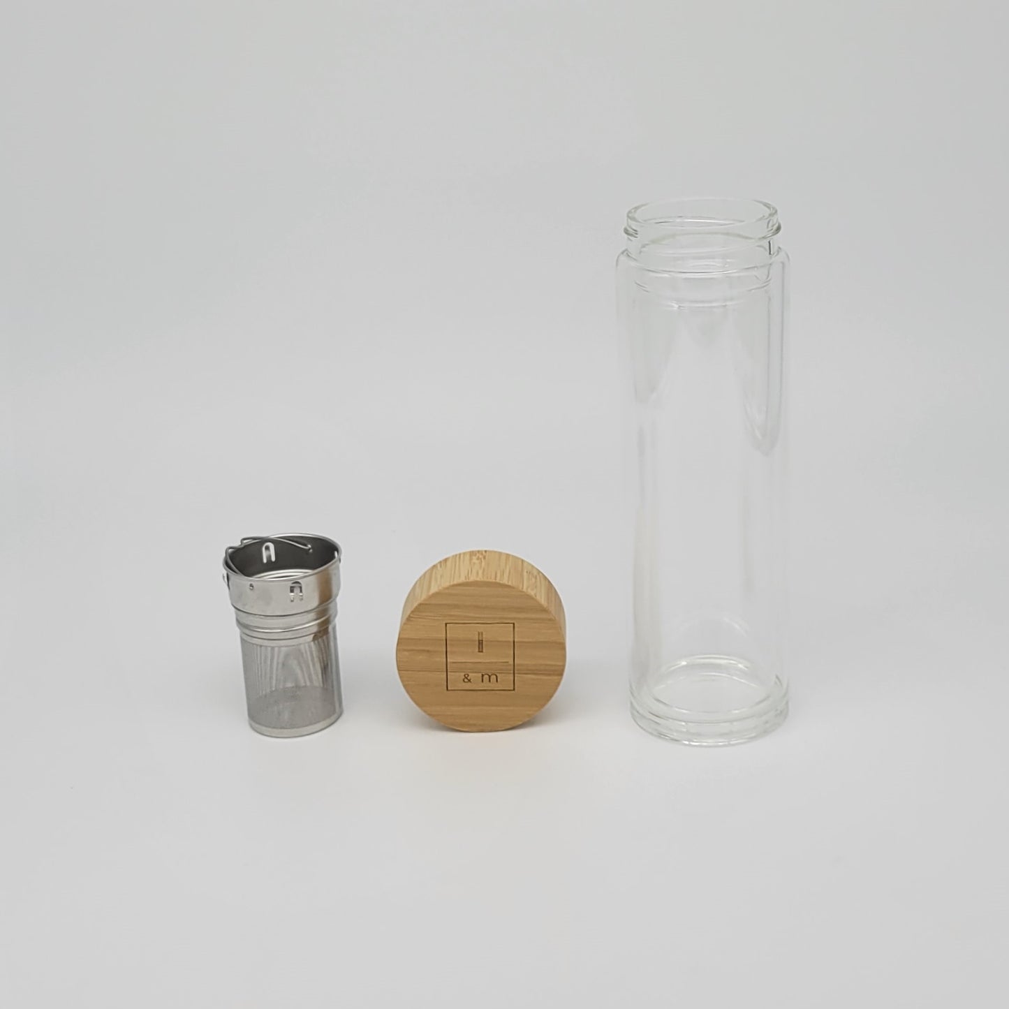 Bamboo and Glass Bottle with Tea Infuser and neoprene sleeve. Travel bottle. Coffee cup, Iced tea tumbler, Hot and cold resistant. I&m